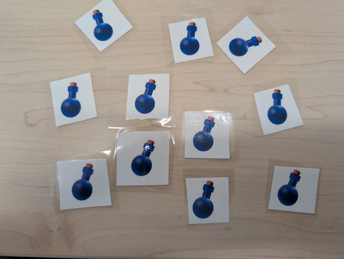 Cartes de potions plastifiées utilisées comme récompenses physiques